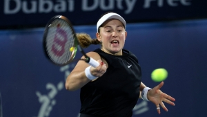 Ostapenko rallies past Halep to tee up Dubai final with Kudermetova