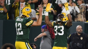 Rodgers and Jones lead Packers to season-first win over Lions