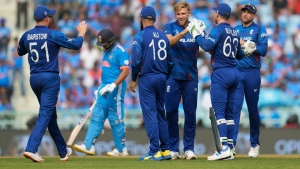 England’s best bowling performance of World Cup restricts India to 229 for nine