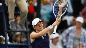 Swiatek rallies from behind to reach ninth WTA final of season