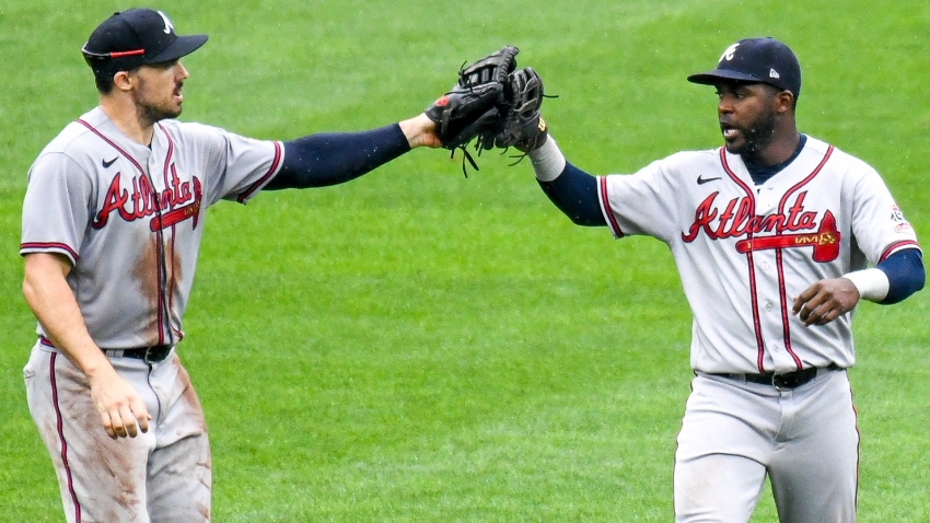 Streaking Braves sweep Orioles, Reds move into wild card position