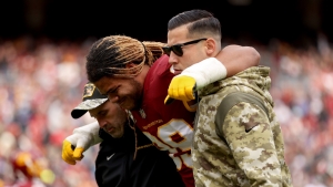 Washington star Chase Young carted off with suspected torn ACL