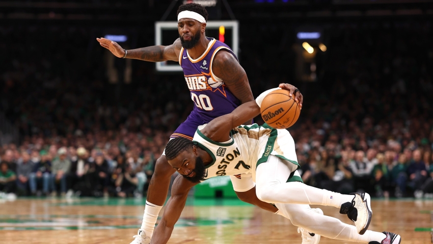 NBA: Celtics sink 25 3-pointers to beat Suns, clinch playoff spot
