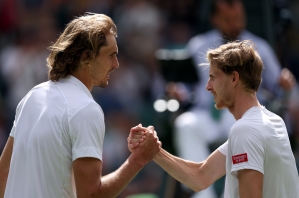 Alexander Zverev makes up for lost time by easing through Wimbledon opener