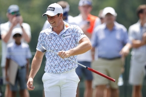 Rory McIlroy three behind lead despite muscle spasms leading into tournament