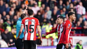 Sheffield United condemn racist abuse sent to Mason Holgate after red card