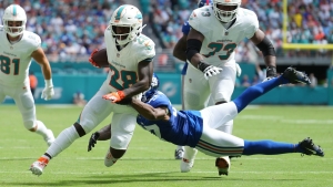 Dolphins placing running back Achane on injured reserve due to injured knee