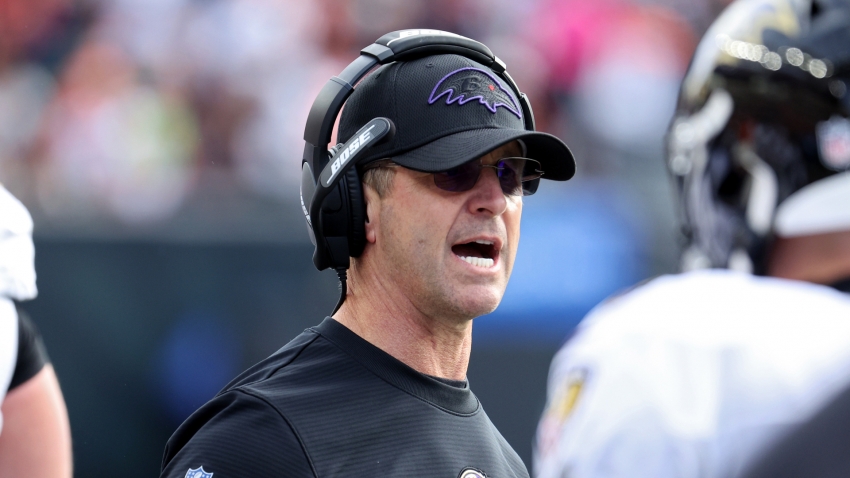 Coach Harbaugh signs three-year extension with Ravens