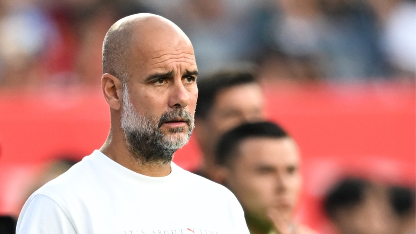 Guardiola committed to Man City amid England links