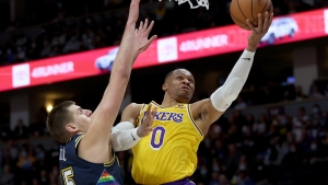 Jokic triple-double condemns Lakers to third straight defeat, Durant injured as Nets win