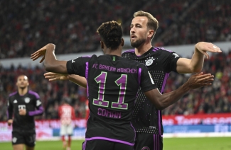 Harry Kane helps Bayern Munich maintain their unbeaten start at Mainz