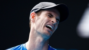 Murray suffers early-season blow but Nadal roars back with doubles win