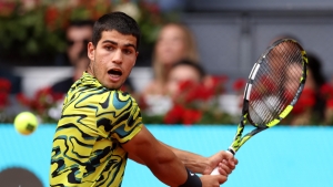 Alcaraz survives major scare to advance at Madrid Open, Ruud stunned by Arnaldi