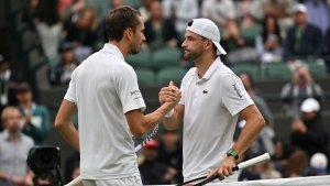 Wimbledon: Medvedev to face Sinner in last eight after Dimitrov retires