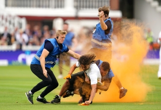 Jonny Bairstow carts protester off Lord’s pitch as Just Stop Oil disrupts Ashes