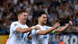 Greece 2-0 Republic of Ireland: Hosts stay top after emotional win