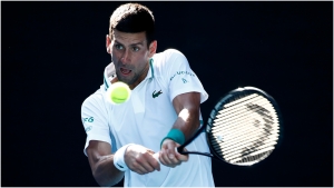 Australian Open: Djokovic survives Tiafoe test