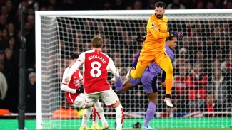 Arsenal capitalise on Alisson Becker errors to cut Liverpool lead to two points