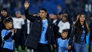 Suarez bids emotional farewell to Uruguay fans after final international game