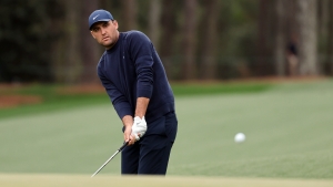 The Masters: Scheffler holds healthy lead as Woods makes the cut