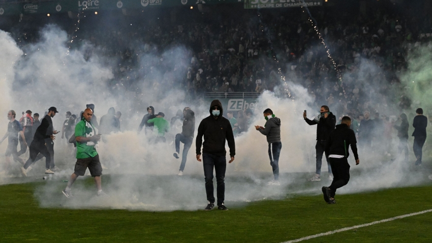 Saint-Etienne fans storm pitch after shoot-out loss to Auxerre confirms relegation
