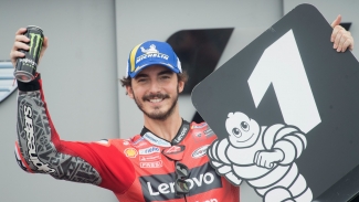 Bagnaia seals Aragon pole with record-breaking lap