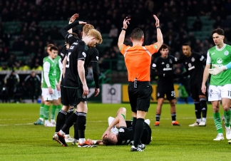Celtic wait for news on injured Alistair Johnston