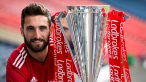 Graeme Shinnie ‘back home again’ after returning to Aberdeen on three-year deal