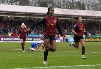 Khadija Shaw celebrates one of her many goals for Manchester City