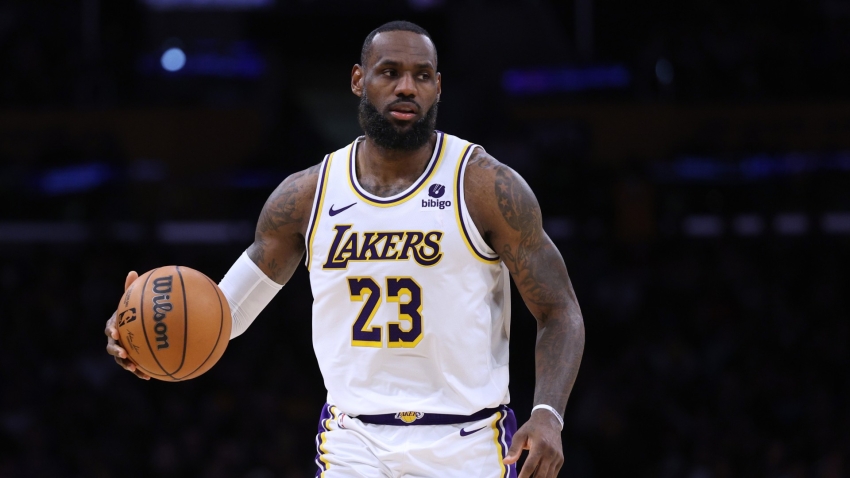 James has triple-double as Lakers outlast Warriors in 2OT thriller
