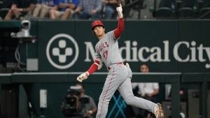 Ohtani beats Rangers on mound and belts 22nd home run to lift surging Angels