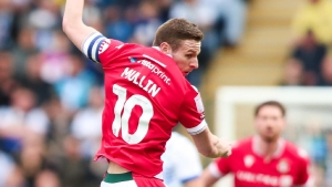 Paul Mullin scores 100th Wrexham goal in win at relegation-threatened Colchester