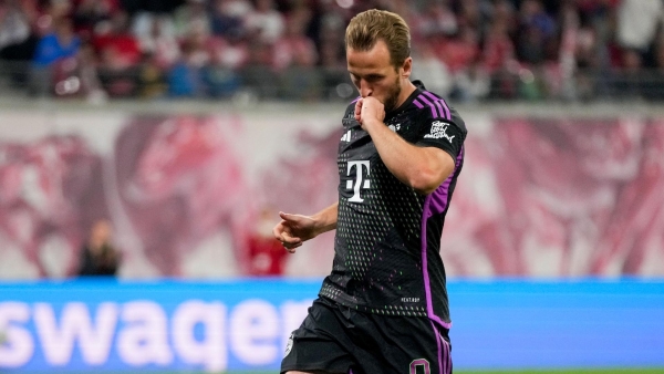 Leipzig's Benjamin Sesko, top, heads the ball during the German