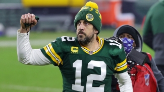 Aaron Rodgers reports to Packers training camp after offseason exile