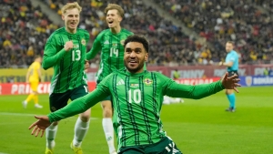 Jamie Reid’s debut goal helps Northern Ireland earn encouraging draw in Romania