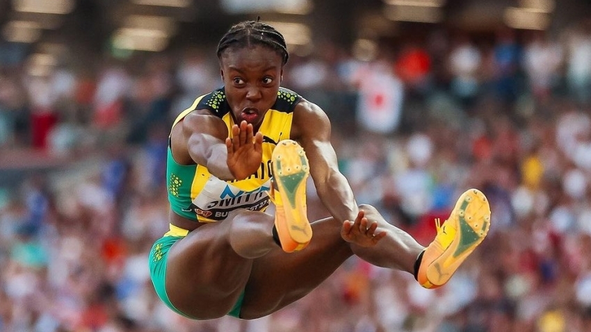 Coach Floreal’s words of encouragement help propel Ackelia Smith’s into long jump final