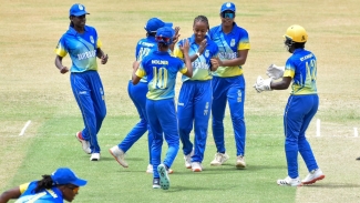 Barbados celebrating an Allison Gordon wicket.
