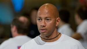 Former Suriname swimmer Anthony Nesty makes history as first Black swim coach to lead U.S. team into the World Championships