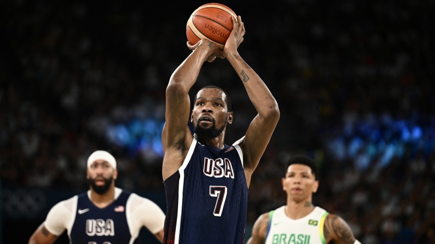 Durant makes Olympics history as USA steamroll into semi-finals