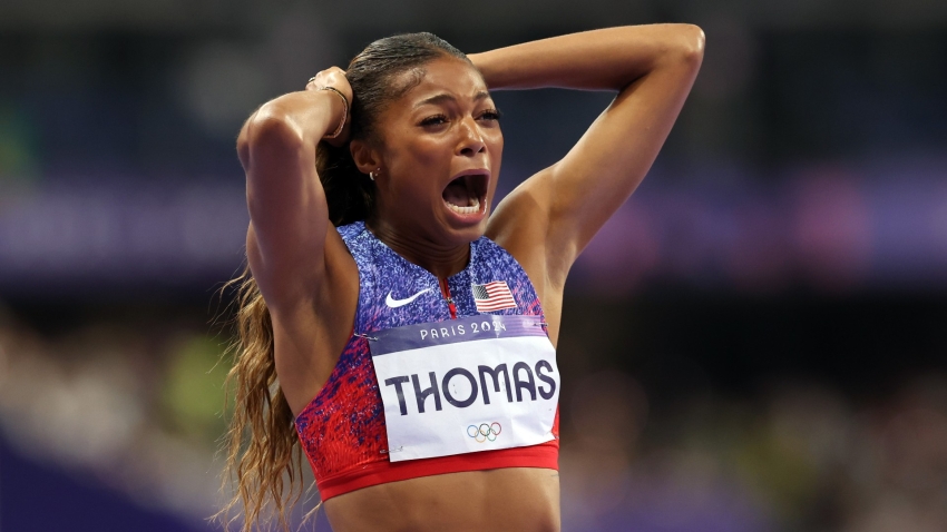 Thomas storms to women&#039;s 200m gold