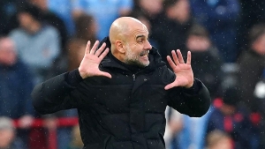 Pep Guardiola says Manchester City held off ‘tsunami’ to earn draw at Liverpool