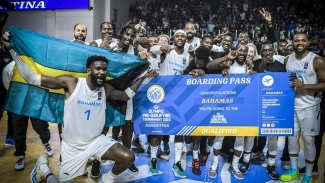 The Bahamas celebrating after defeating hosts Argentina to win the FIBA  Americas Pre-Olympic Qualifying Tournament.