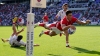 Louis Rees-Zammit claims hat-trick of tries as Wales comfortably top group