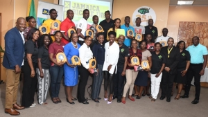 Team Jamaica Bickle donating defibrillators at JAMPRO Headquarters in 2019.