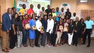 Team Jamaica Bickle donating defibrillators at JAMPRO Headquarters in 2019.