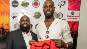Nicholai Brown and Wayne Dawkins of P.H.A.S.E 1 Academy after Brown was the first player selected in the draft for the Caribbean Basketball Summer League at Ribbiz Sports Bar in Kingston on Saturday.