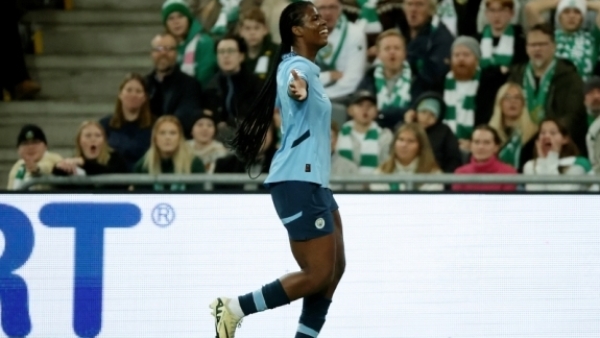 Khadija Shaw celebrates one of her two goals in Stockholm on Thursday.