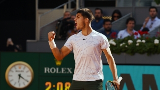 Alcaraz overcomes injury to beat Nadal and set up showdown with Djokovic