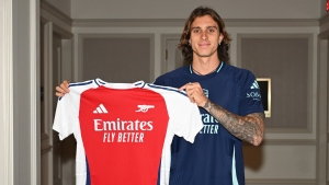 Arsenal sign Italy defender Calafiori from Bologna