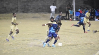 Action between Cayon and Sandy Point on Friday in the SKNFA Premier League.